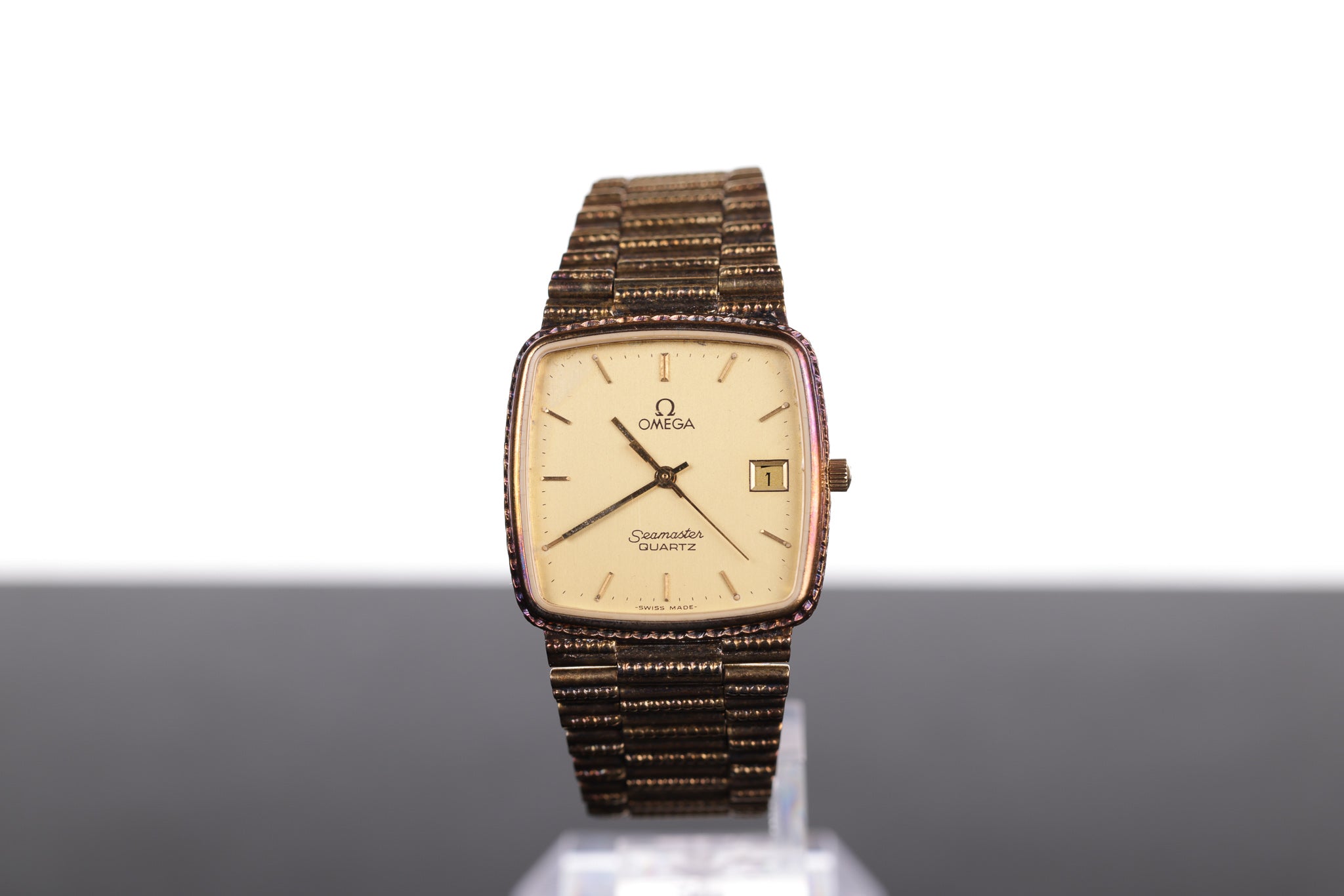 Omega quartz outlet gold